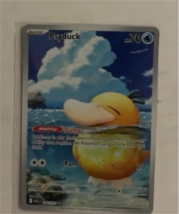Misty's Psyduck, graded 7.0