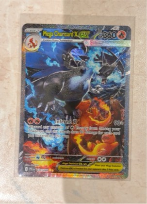 Mega Charizard X ex, graded 8.5