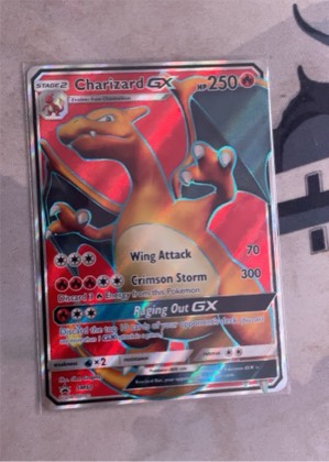 Charizard GX, graded 8.5
