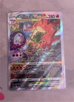 Charizard VSTAR, graded 9.0