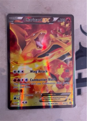 Charizard-EX, graded 8.0