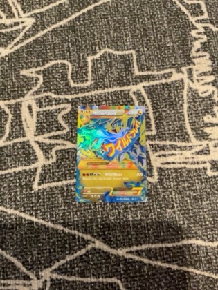 M Charizard EX, graded 6.5