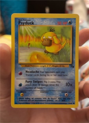 Psyduck, graded 8.0