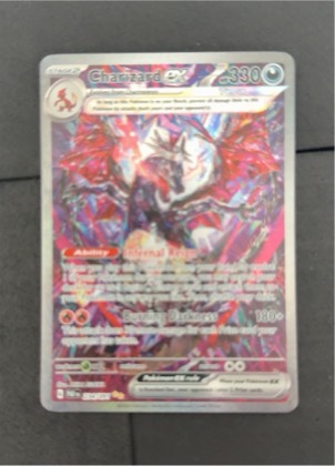 Charizard ex, graded 9.0