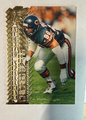 1996 Topps Laser Alonzo Spellman, graded 8.5