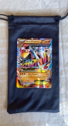 Primal Groudon EX (Omega), graded 8.5