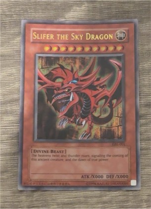 Slifer the Sky Dragon (Secret Rare), graded 9.0