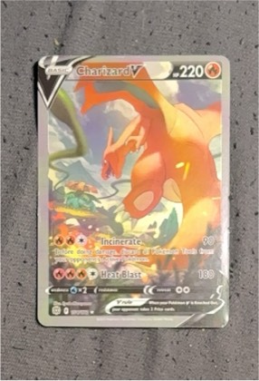 Charizard V graded 8