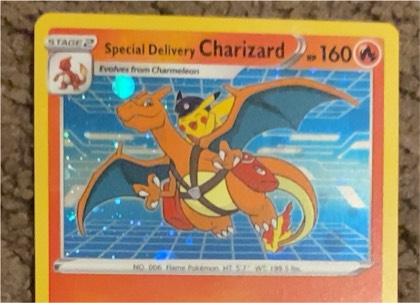 Special Delivery Charizard, graded 8.5