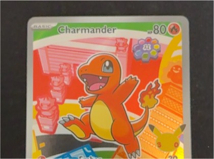 Charmander - 023/185 (Reverse Cosmos Holo), graded 9.0