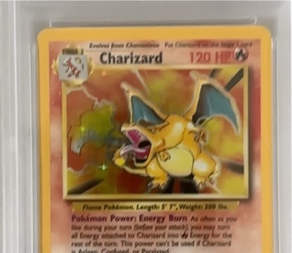 Charizard graded 6 & below