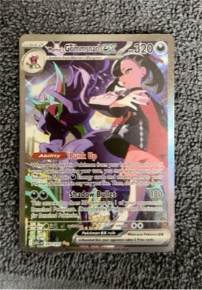Marnie's Grimmsnarl ex, graded 8.5