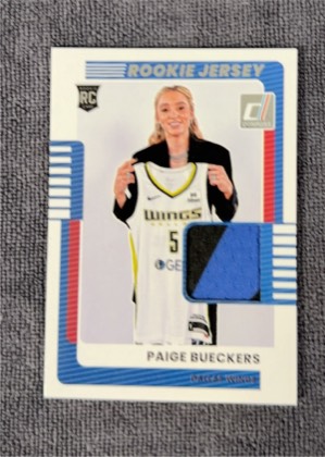 Paige Bueckers, graded 9.5