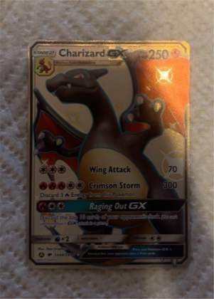 Charizard GX, graded 7.5