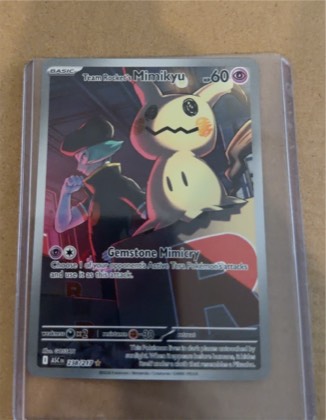 Team Rocket's Mimikyu, graded 9.0