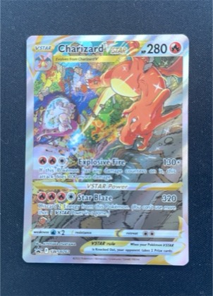 Charizard VSTAR graded 9