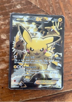 Pikachu EX - XY124, graded 2.5