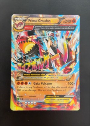 Primal Groudon EX (Omega), graded 5.0
