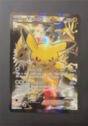 Pikachu EX, graded 6.5