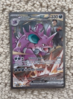 Team Rocket's Nidoking ex, graded 9.0