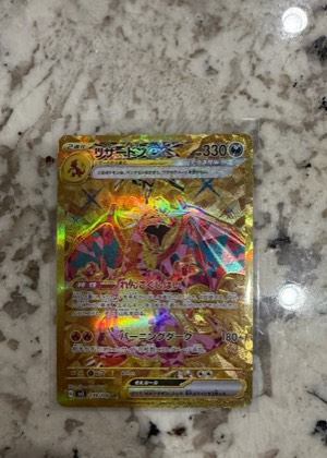 Charizard ex, graded 9.0