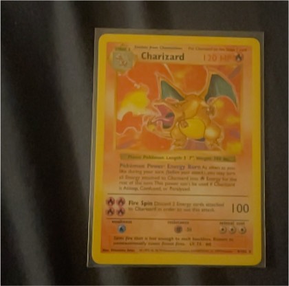 Charizard graded 7