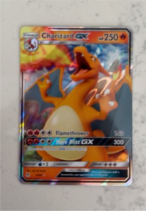 Charizard GX, graded 9.0
