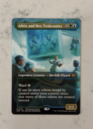 Adrix and Nev, Twincasters (Borderless), graded 7.0