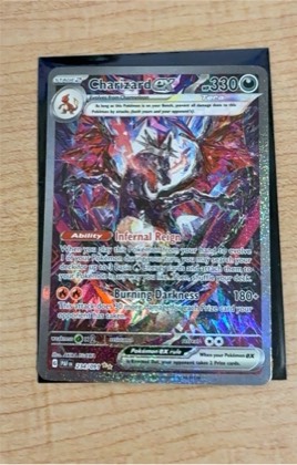 Charizard ex, graded 9.0