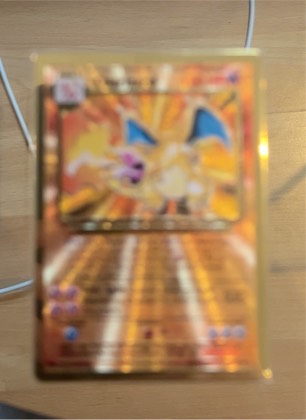 Charizard graded 6 & below