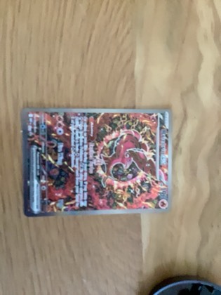 Charizard ex, graded 7.0
