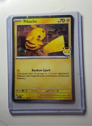Pikachu - 051/162 (Cosmo Holo), graded 6.5