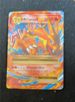 M Charizard EX (Y), graded 5.0