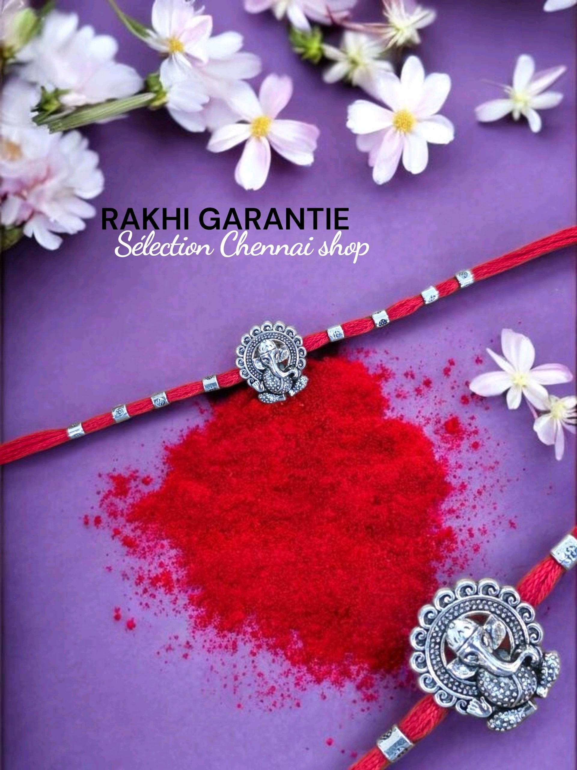 Rakhi Ganesh argenté sur fil rouge