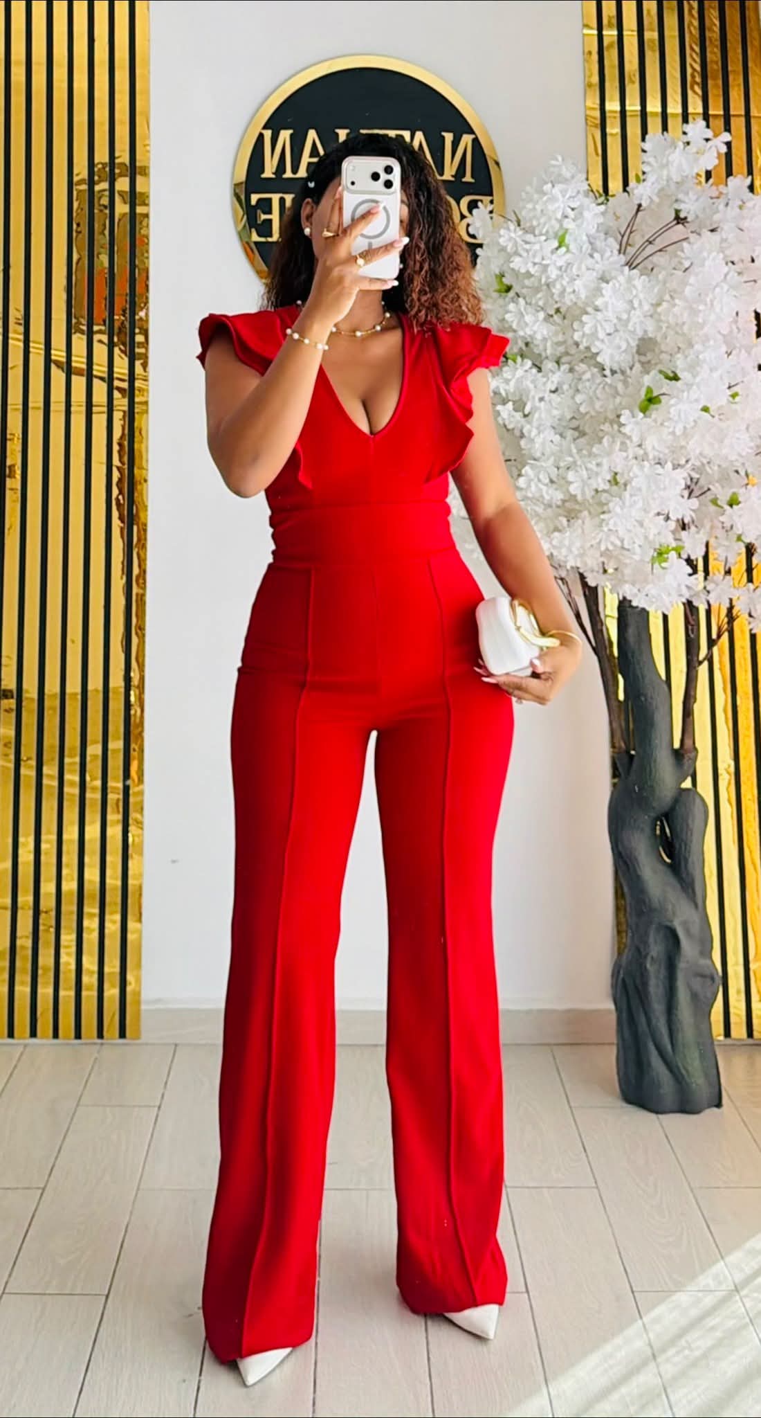 Combinaison rouge chic col V taille haute pantalon évasé