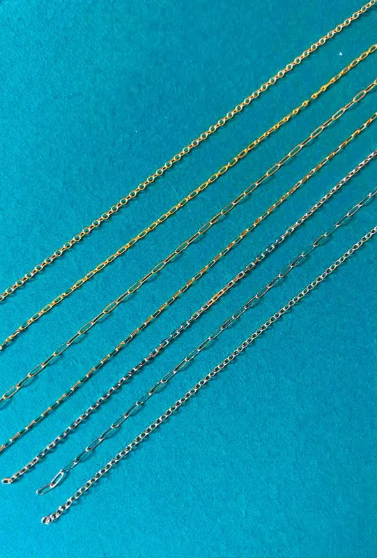 Close-up shot showcasing various friendship bracelet designs and charm options