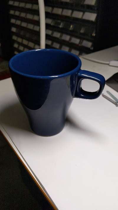 Blå mugg i keramik - 30 kr