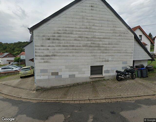 Grundstück bebaut mit Einfamilienhaus