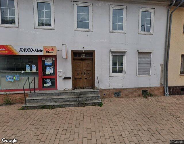 Wohn-/Geschäftshaus, mehrere Nebengebäude