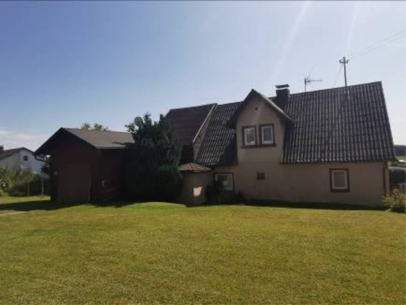 Einfamilienhaus mit Anbau und Holzgarage in Erllohe 25, 00000 Nagel - Bild 3