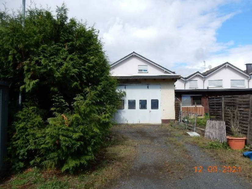 Mehrfamilienhaus, Gebäude- und Freifläche in In der Wolfskaute 18-22, 61130 Nidderau, Ostheim - Bild 5