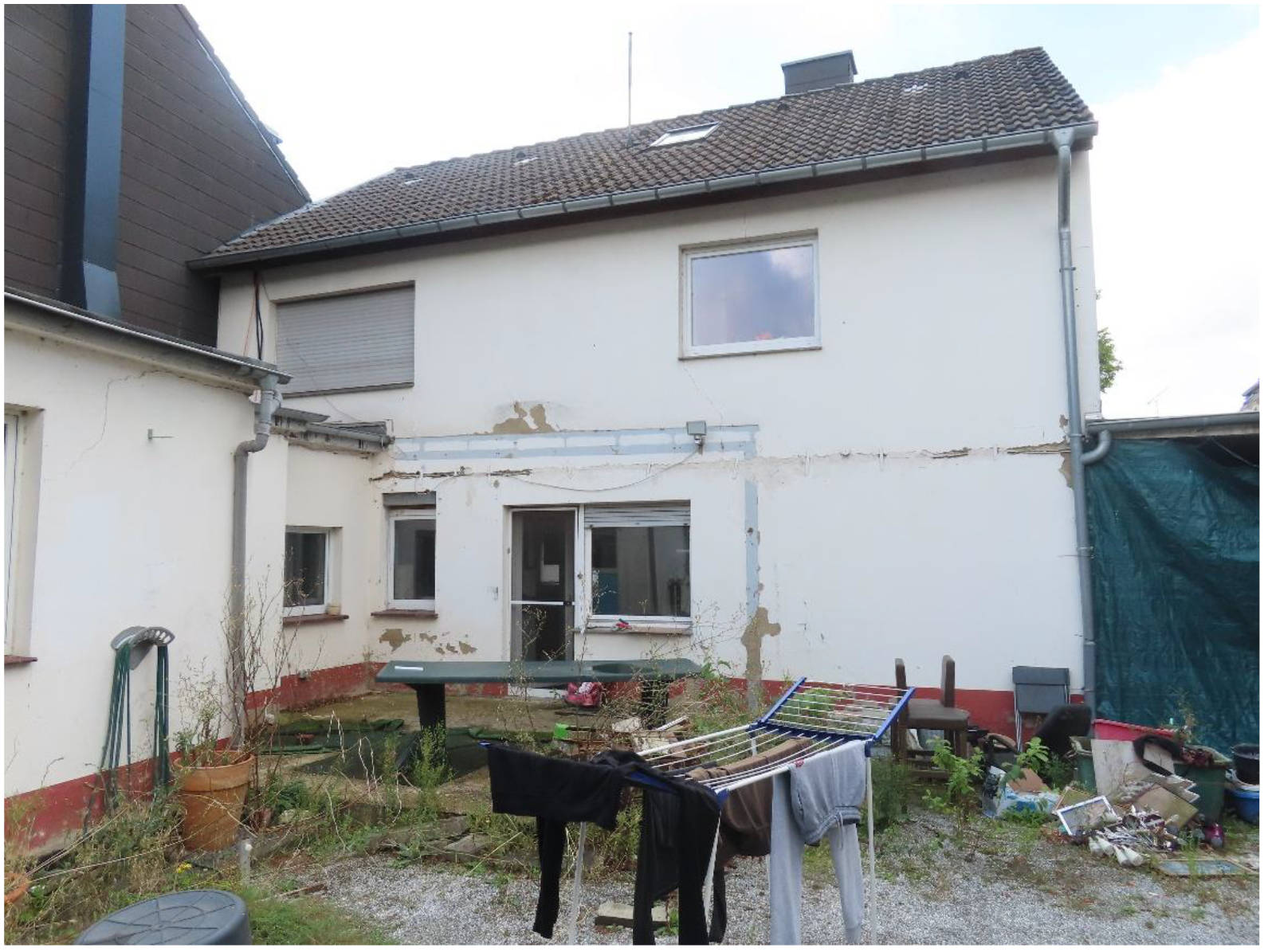 Garage, Einfamilienhaus, Einfamilienhaus mit Anbau und Garage in Bachstraße 18, 52445 Titz, Hasselsweiler