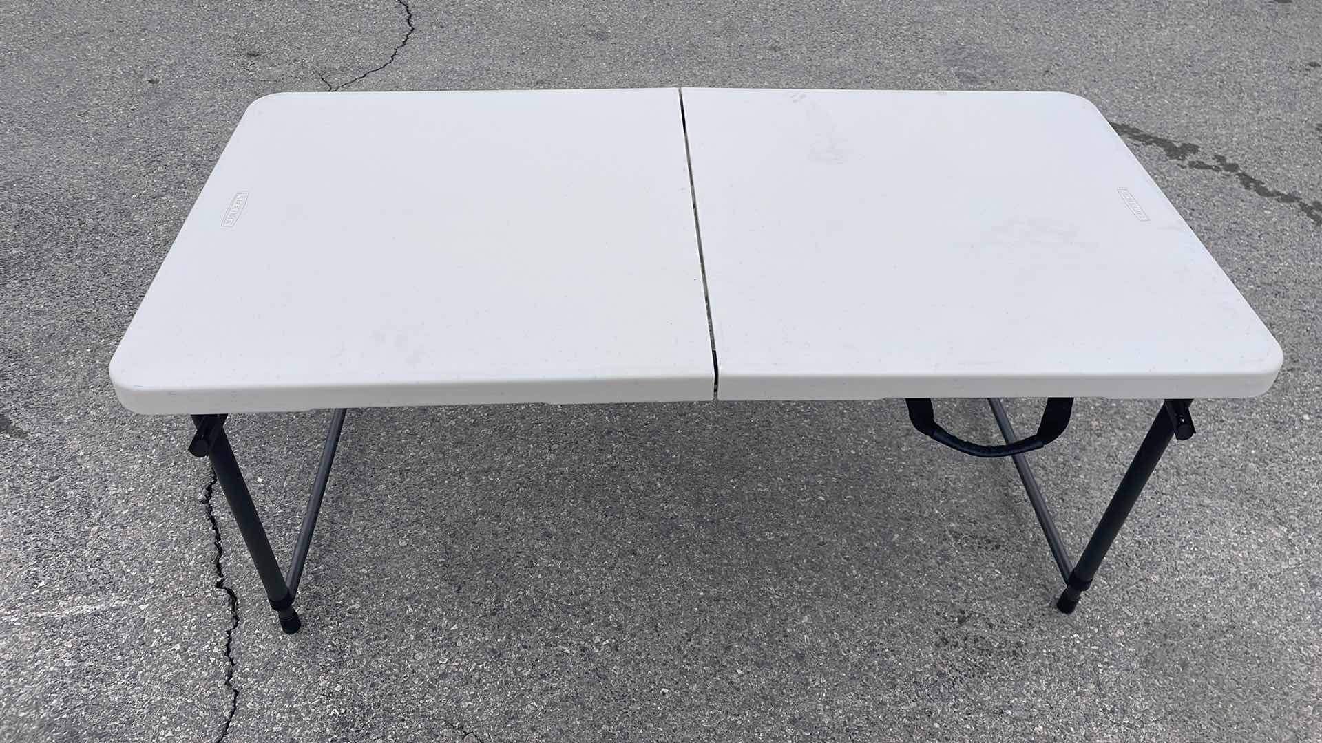 Photo 3 of LIFETIME FOLDABLE ADJUSTABLE HEIGHT 48” x 24” TABLE MODEL 80455