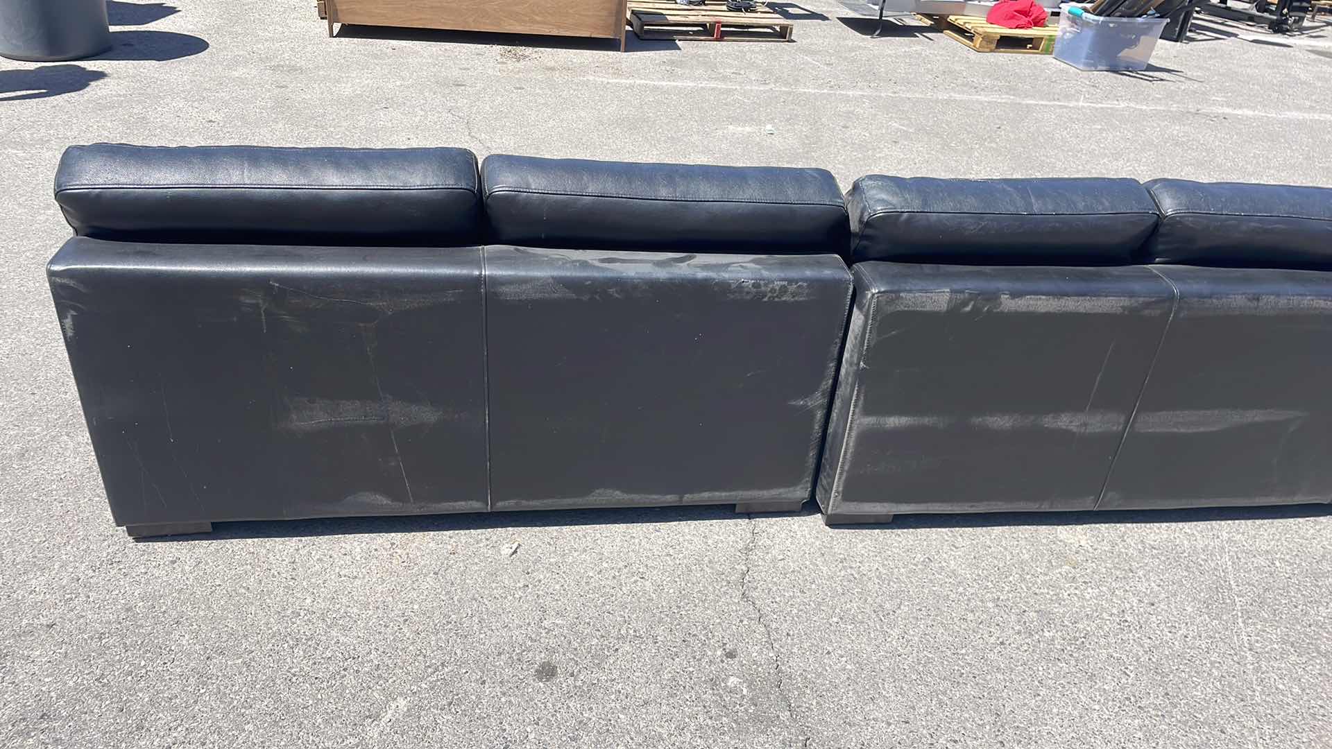 Photo 7 of BLACK LEATHER MULTI SECTION COUCH 165” x45”