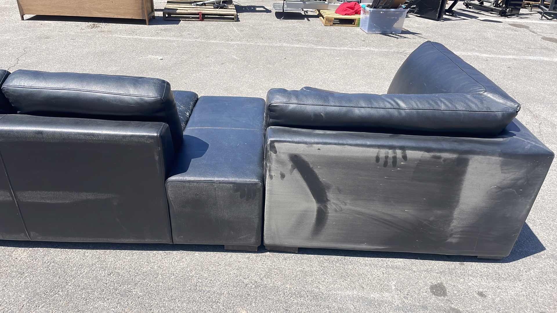 Photo 8 of BLACK LEATHER MULTI SECTION COUCH 165” x45”