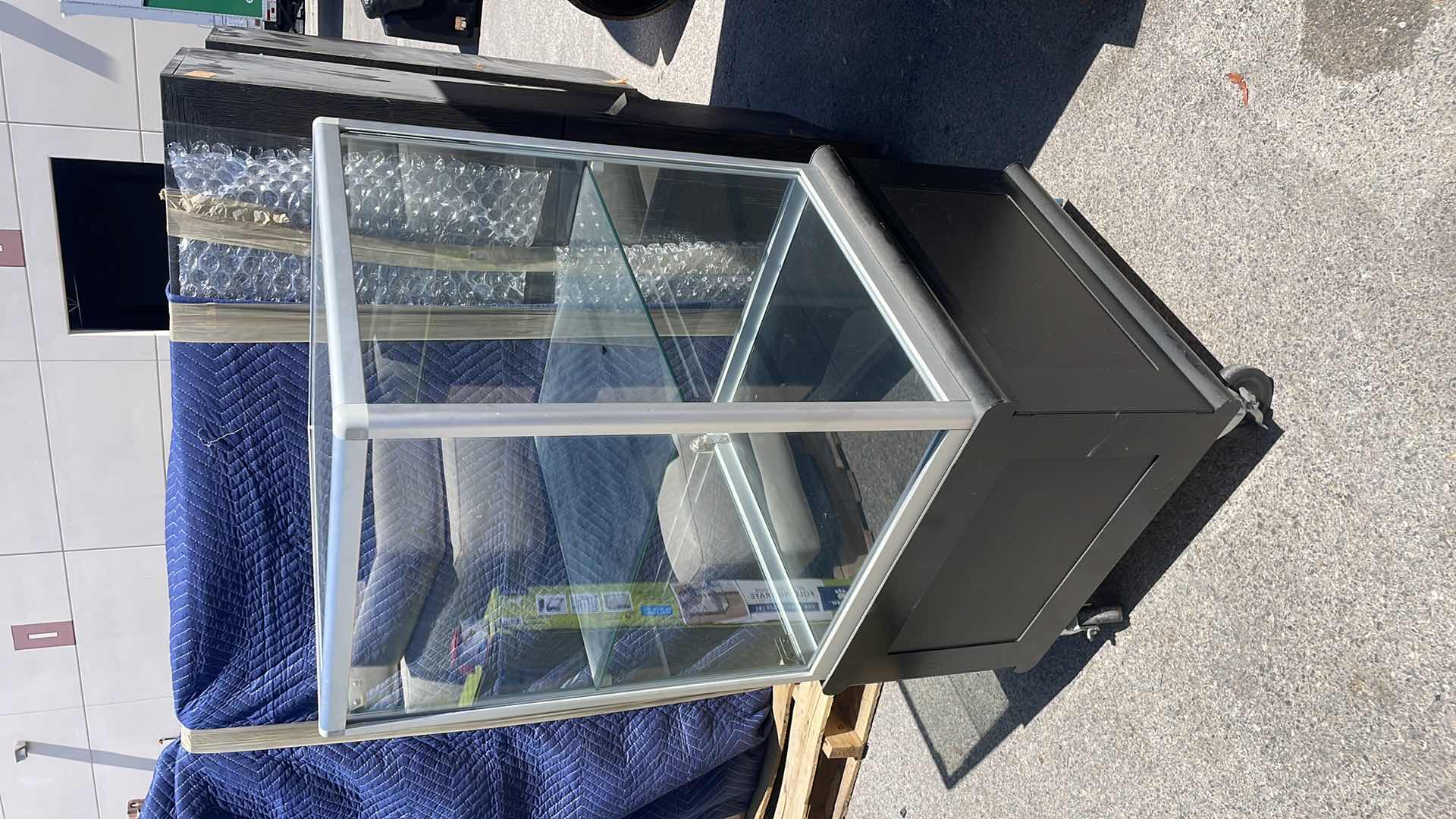 Photo 3 of GLASS DISPLAY CASE ON WHEELS 23” x 23” x 48” LOCKED AND NO KEYS