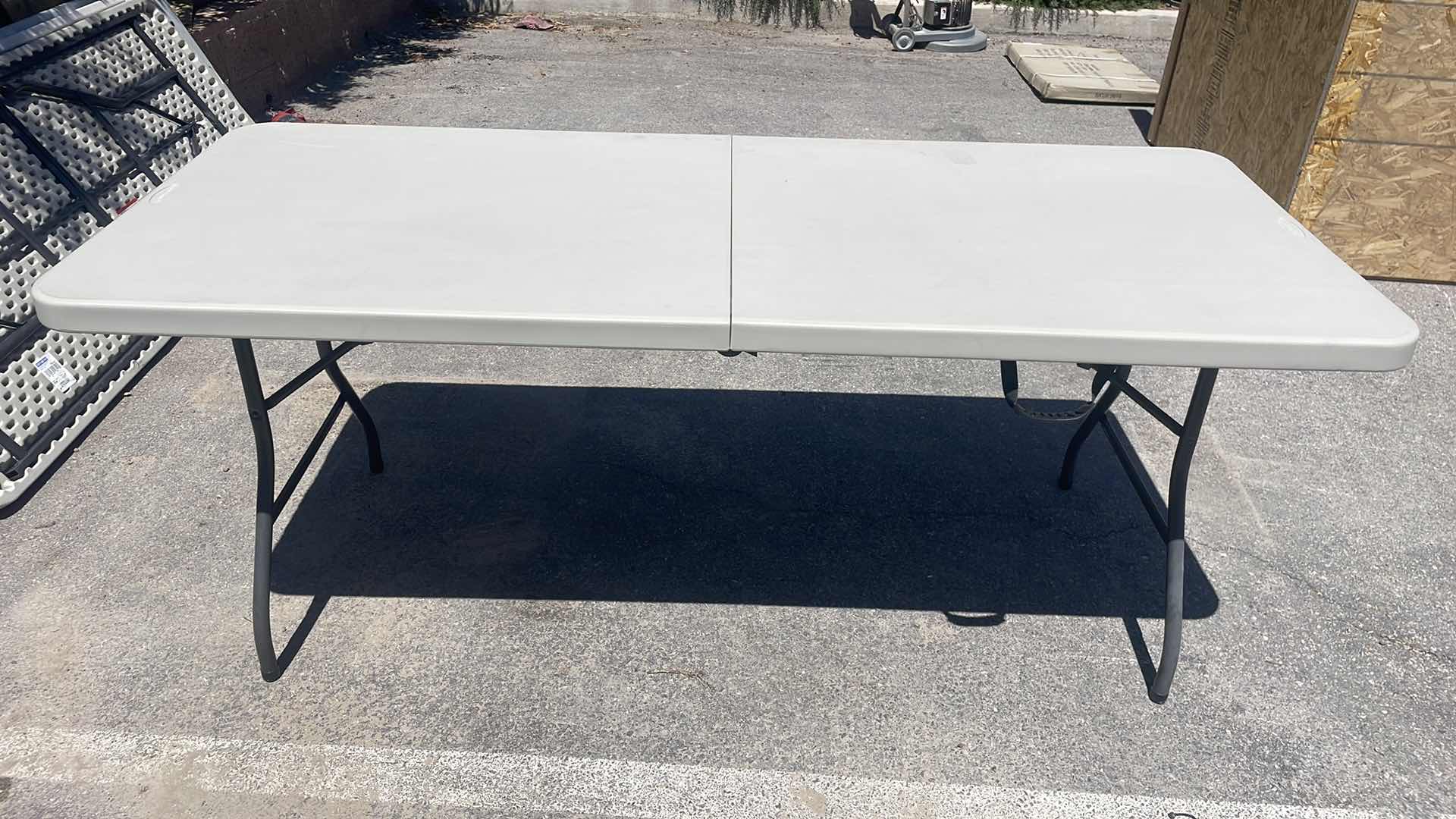 Photo 2 of SAMSONITE FOLDING TABLE 72” x 29-1/2”