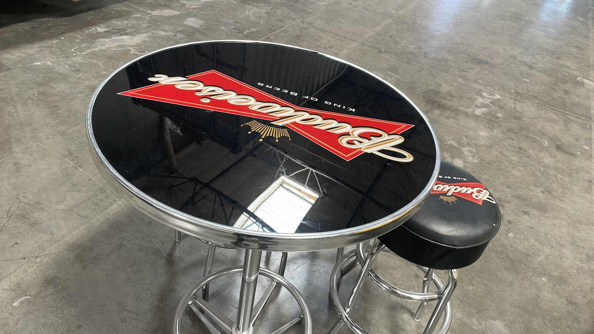 Photo 4 of BUDWEISER BAR TABLE 27” AND 3 BAR STOOLS