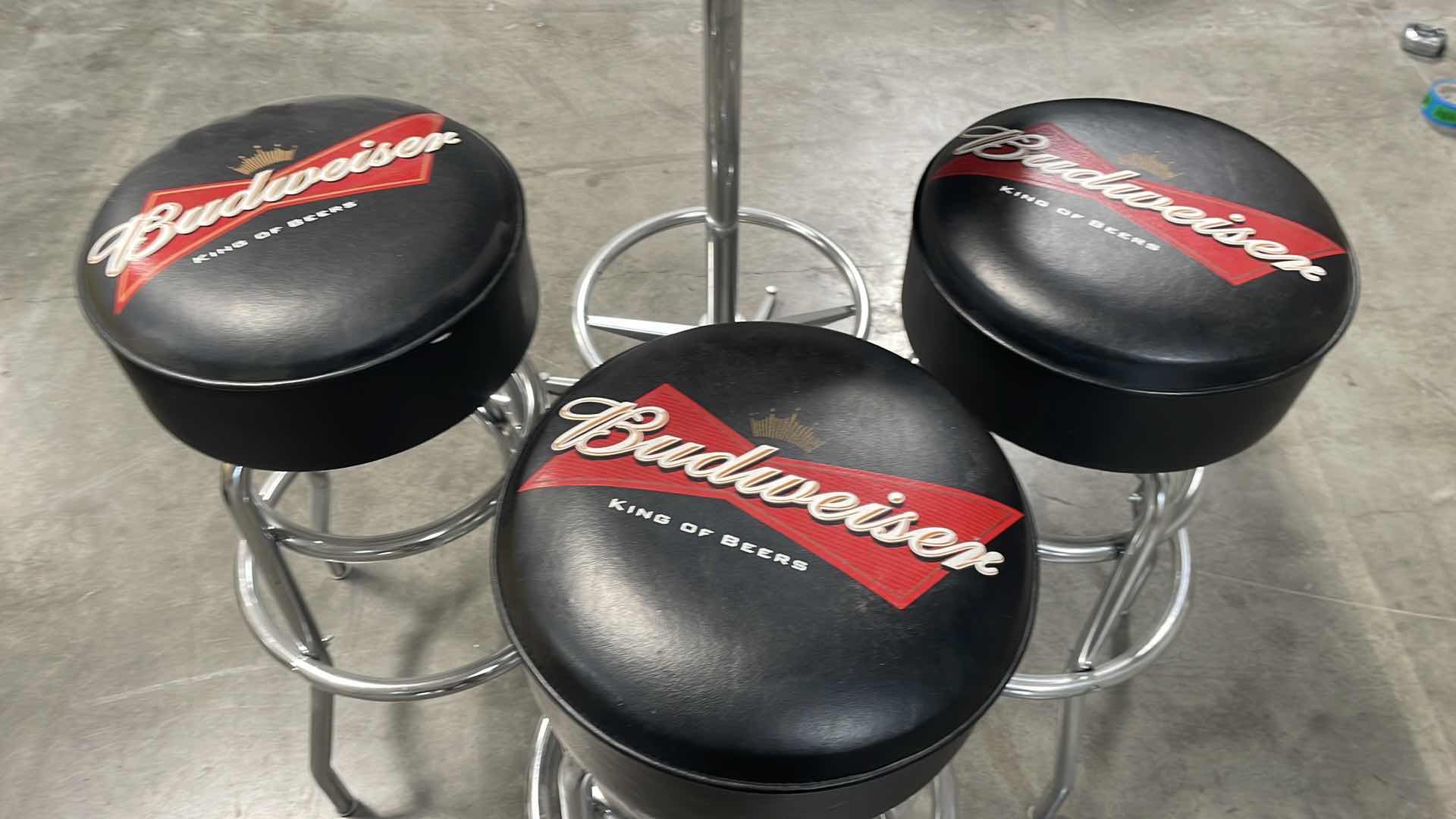 Photo 2 of BUDWEISER BAR TABLE 27” AND 3 BAR STOOLS