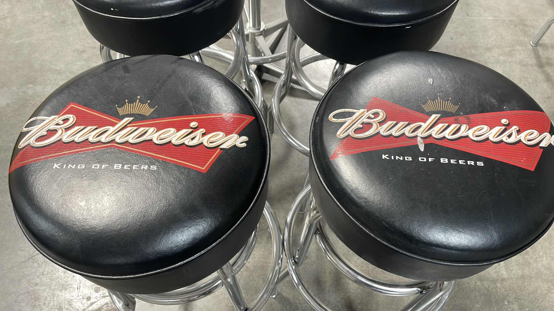 Photo 2 of BUDWEISER BAR TABLE 27” AND 4 BAR STOOLS